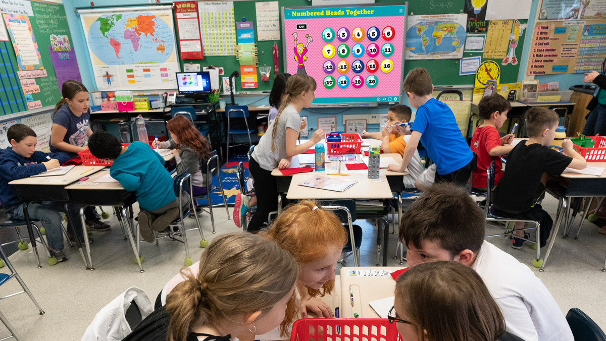 Elementary students working in teams during a Numbered Heads Together lesson